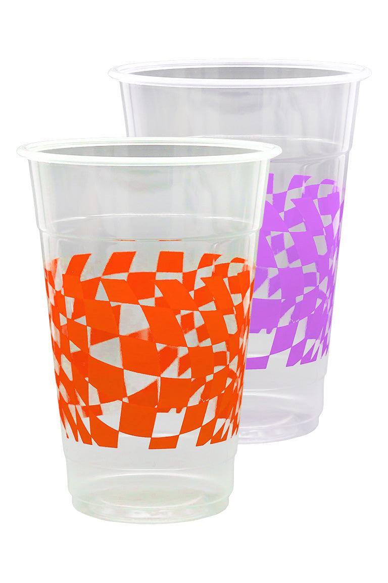 Two different color cups with a checkered pattern. One with an orange color the other with purple. 